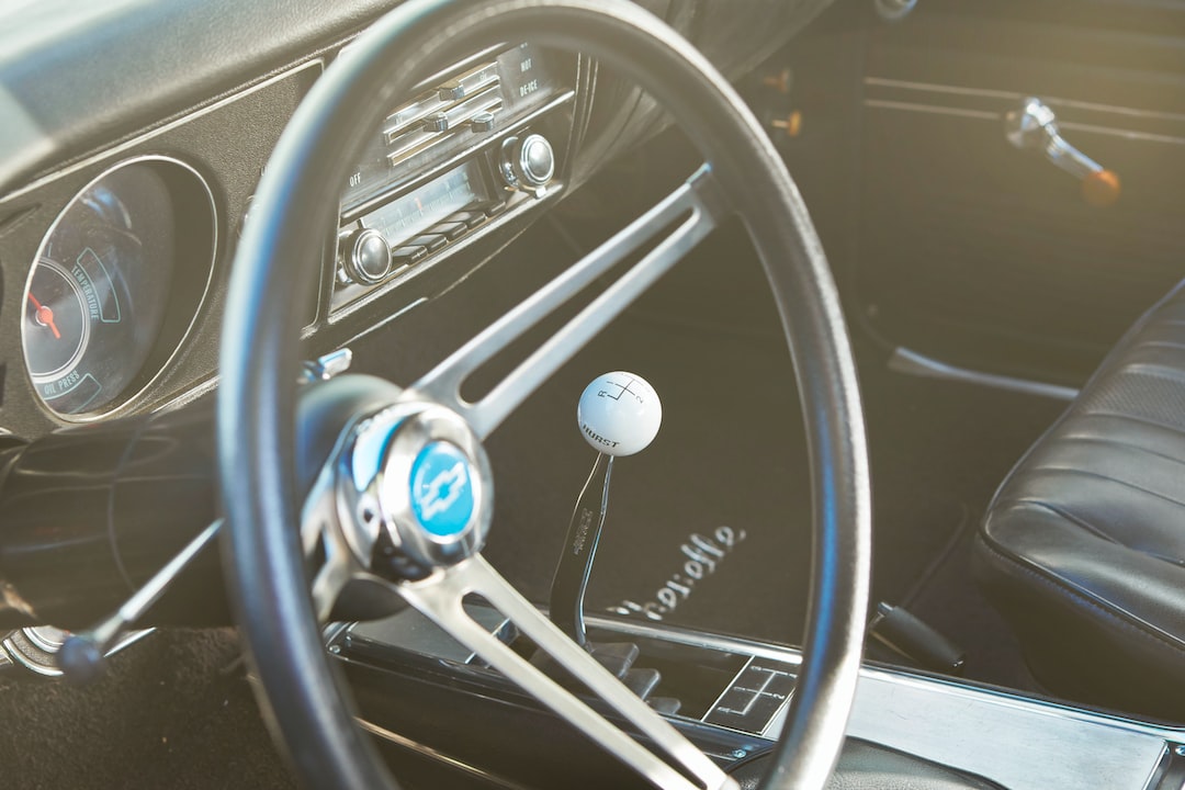 white steering wheel and car steering wheel