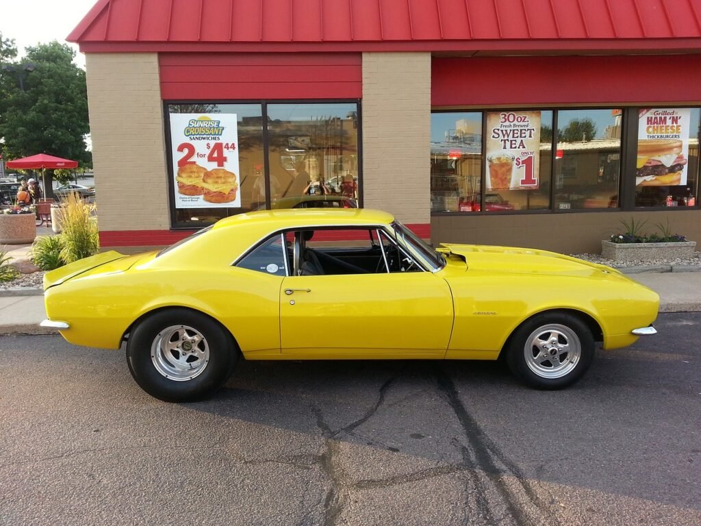 bright yellow first-gen chevy camaro