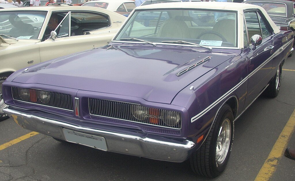 purple/plum crazy 1976 dodge charger at a car show
