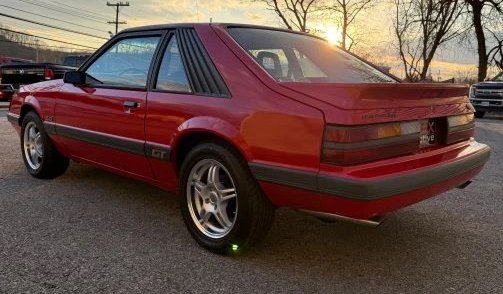 1986 Mustang GT Four-Eye Fox Body rear quarter view 
